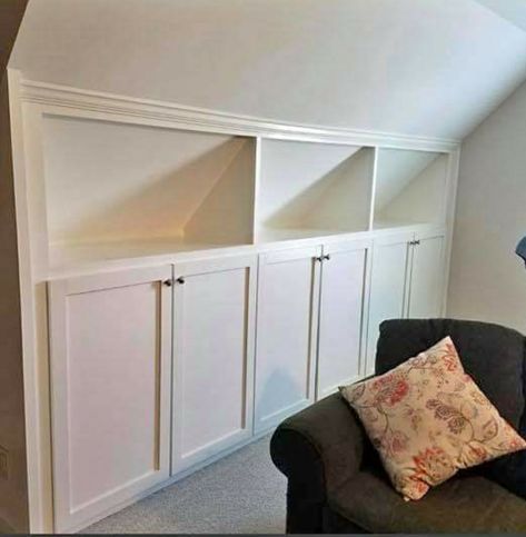 Sloped Ceiling Storage Ideas, Attic Cabinets, Kneewall Storage, Sloped Ceiling Storage, Ceiling Storage Ideas, Book Lovers Bedroom, Chalet Bungalow, Dormer Bedroom, Built In Wall Shelves