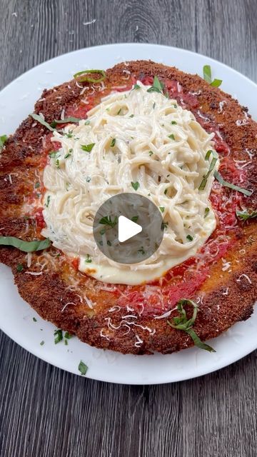 Angela Miley on Instagram: "Chicken Parm Pizza Style 🍕🍝 This is one of my favorite dishes from the @cheesecakefactory so I had to make it at home! It was so delicious 🤤 let me know if you want the full recipe! #thesecarbsdontcount" Cheesecake Factory Chicken Parm Pizza, Chicken Parm Pizza, Pizza Chicken, Pizza Style, Chicken Parm, Chicken Parmesan, So Delicious, Let Me Know, Make It