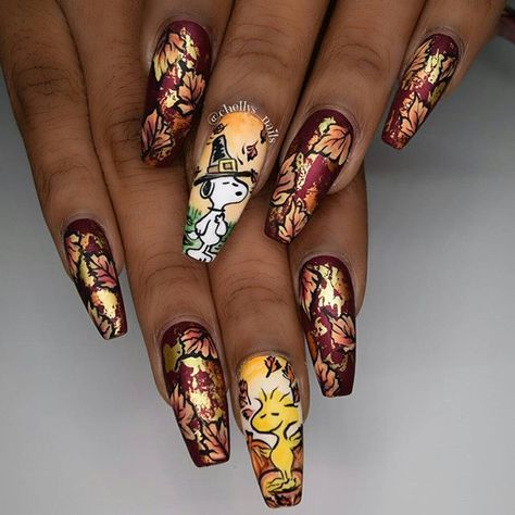 Thanksgiving with Charlie Brown/Snoopy! With lots of love! HAND PAINTED NAIL ART! #nails #nailsinorlando #nailsinkissimmee #nailpro #nailart #nailjunkies #nailartaddict #nailporn #nailprodigy #exoticnails #nailjunkies #nailartaddict #glitternails #cutenails #greatnails #nailsofinstagram #handpaintednailart #gelnails #vetrousa #valentinobeautypure #nailsmagazine #orlandonailtech #nailmob #nailpromagazine #orlandonails #nailswag #nailcouture #fallnails #charliebrown #snoopynail Nails Fall Coffin, Snoopy Nails, Snoopy Fall, Thanksgiving Nail Designs, Thanksgiving Nail Art, Winter Nails Acrylic, Fall Acrylic Nails, Painted Nail Art, Thanksgiving Nails