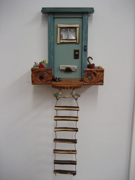 I can easily imagine a fairy climbing up this ladder. Diy Fairy Door, Fairy Garden Doors, Tree Door, Bookshelf Art, House Tree, House Door, Fairy Crafts, Miniature Rooms, Diy Fairy