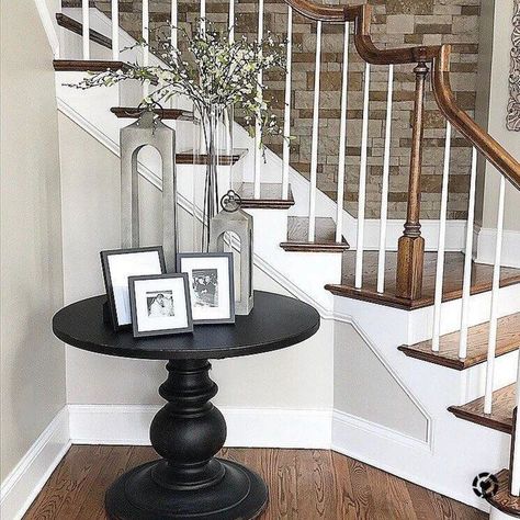 Foyer By Stairs Entryway, Round Foyer Tables, Stairway Entryway Ideas Foyers, Round Table Staircase, Round Foyer Table Decor Entryway Modern, Round Table Entry Way, Small Round Foyer Table, Round Table In Entryway, Entryway Table Round