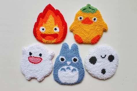 🔥 Studio Ghibli fans, assemble! How cute are these punch needle coasters?! We’ve got Totoro, Calcifer, the Warawara, some lil tree spirits, and a surprise ducky friend all ready to guard your mugs! Each coaster is handmade with love, perfect for adding a touch of Ghibli magic to your day. ✨ Treat yourself or grab a set for your favorite Ghibli buddy! We’ve got tons of other awesome creations in our shop, so come check us out! . . . . . #ghiblilove #totorocoaster #calcifercoaster #catbusco... Studio Ghibli Diy, Studio Ghibli Crafts, Punch Needle Coasters, Tree Spirits, Cute Coasters, Tree Spirit, Mug Rug, Handmade With Love, Punch Needle