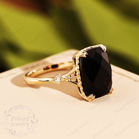 (Please confirm your US size when you make an order)========================================================================================Jewelry Details-Gold Type : 14k goldCenter Stone: NATURAL Black Onyx 8*11mm, Approximately 4.25ctCut: Cushion shape rose cutSide Stone: 0.02cttw diamondColor: G-HClarity: SI1Cut: Round Cut / 3EXBand Width: Approximately 1.5mmSKU: YR0249========================================================================================~*-*~Purchase Guarantee:- All our je Black Stone Wedding Rings For Women, Black Onyx Wedding Ring, Black Diamond Engagement Ring Gold, Black Onyx Rings Women, Onyx Engagement Ring, Plus Size Rings, Black Engagement Ring, Yellow Gold Engagement Ring, Jewelry Details