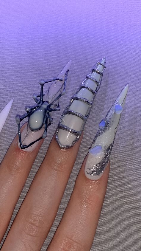 #nails #nailart #3dart #naildesign #aesthetic #whitenails #chrome #spider #nailartdesign Silver Spiderweb Nails, Spiderweb Pedicure, 3d Spider Nails, Spider Nail Designs, Catwoman Nails, Grabbers Nails, Halloween Stiletto, Nails With Spider, Claw Nails Designs