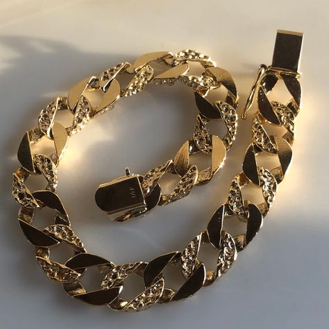 This is a flashy cuban style link bracelet. It is a nice wide width with nugget-like detail on every-their link. It can be unisex. It is a standard 7.5 inches so could fit a smaller wrist of a male. Solid Links. Crafted in 14K Yellow gold. Length 7.5 inches Sliding lock with safety clasp Weight: 18.21 grams With any pre-owned/Vintage/Antique items, it is common to have some wear, As we inspect each piece of our jewelry, we make sure the wear and tear is acceptable within industry standards FOLLO Funky Rings, Cuban Style, Lexus Ls, 21 Grams, Slide Lock, Lock Style, Gold Armband, Gold Aesthetic, Bracelet Mens