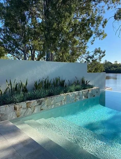 Everything You Need to Know Before Building a Pool in Your Backyard Australian Backyard Pool, Pool Decoration Ideas, Pool Ideas Backyard, Pool Rooftop, Raised Pools, Pool Paving, Outdoor Pool Area, Swimming Pool Landscaping, Pool Renovation