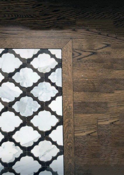 Decorative Floor Tile Entryway, Tile And Wood Entryway, Front Foyer Flooring Ideas, Foyer Tile Design, Tiled Front Entrance, Tile Entryway Transition To Wood Floor, Foyer Tile To Hardwood Transition, Entrance Way Flooring Ideas, Entry Foyer Flooring Ideas