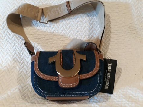 NWT True Religion purse. Large gold logo on flap of bag. Adjustable strap bag. Great denim fabric. Please look closely at the photos and ask any questions you have. Thanks and Happy Ebaying!! True Religion Bag, True Religon, Adjustable Strap Bag, Strap Bag, Fancy Bags, List Ideas, Gold Logo, Denim Fabric, Bag Straps