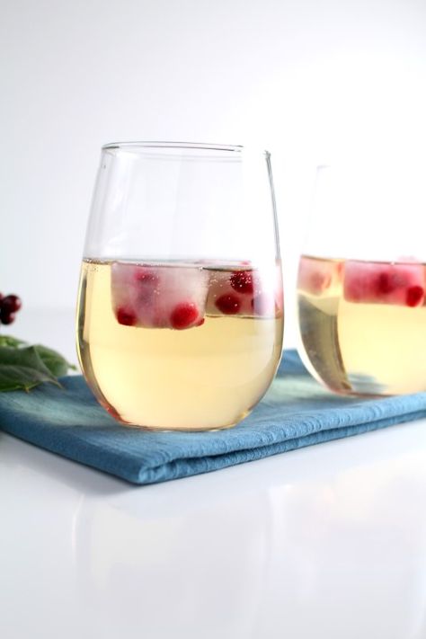 Sparkling White Cranberry Grape Punch – with Pomegranate Ice Cubes White Cranberry Punch, White Grape Juice Punch, Cranberry Ice Cubes Holiday Drinks, Sparkling White Grape Juice Punch, Sparkling Grape Juice Punch, Punch With Cranberry Juice, Grape Punch Recipes, Vodka Cranberry Punch Recipes, Ginger Ale Punch