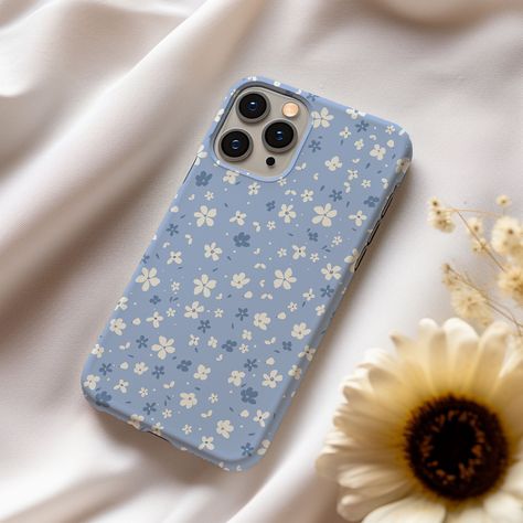 This Cute Blue Flowers design case makes a perfect addition to your iPhone. The design is UV printed onto the case for extra durability and you can choose between a snap or tough case with a gloss or matte finish. Snap Case: * The case protects the sides with an open top and bottom * Design wraps fully around the case * Slim form factor & lightweight * Impact resistant Polycarbonate material * Open ports for connectivity * Matte or Gloss finish Tough Case: * Dual layer case for extra protection Phone Cases Flowers, Clear Phone Case Design, Iphone Blue, Preppy Phone Case, Phone Case Diy Paint, Diy Phone Case Design, Cardboard Crafts Diy, Blue Phone Case, Magsafe Case