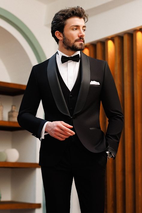 Elevate your formal style with our black slim-fit tuxedo 3-piece set, making a statement of refined elegance. The single-breasted blazer, complete with peak lapels and a fully lined interior, exudes sophistication and attention to detail. #groom #mensstyle #tuxedo #blacktie #blacktuxedo #menattire #menwear #attire #menoutfit #fashion #stylish #dapper Men Tuxedo Wedding, Tuxedo For Men Wedding, Tuxedo Suit For Men, Black Tuxedos, Wedding Suits Men Black, Blazer Waistcoat, Groom And Groomsmen Suits, Wedding Tux, Stylish Mens Suits