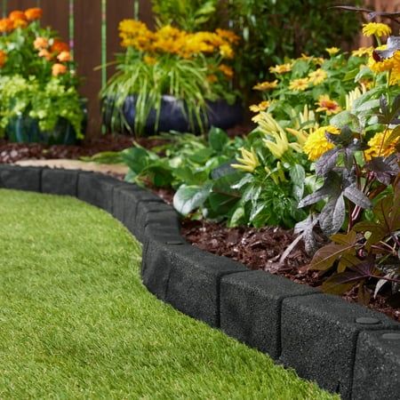 Transform your garden with ease using GroundSmart Cobblestone Rubber Landscape Edging Made of flexible rubber, this edger curves to your landscape for a beautiful finish. Installation is a breeze with the SmartLoc connecting system, results in a seamless fit between edging pieces for a professional look. GroundSmart Cobblestone Landscape Edging is perfect for flower beds, walkways, patios and much more. The no dig installation makes set up simple and hassle-free. Make your landscape stand out with the GroundSmart Cobblestone Landscape Edging. Size: 48" x 3" x 3".  Color: Black. Paver Garden Edging, Wooden Garden Edging, Plastic Landscape Edging, Plastic Garden Edging, Garden Lawn Edging, Yard Edging, Patio Edging, Garden Border Edging, Flower Bed Edging