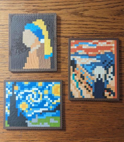 Add a unique blend of tradition and modernity to your home or office with these pixel-style renditions of famous classical paintings. Each mini-painting is crafted to depict iconic artworks like Girl with a Pearl Earring, The Scream, and Starry Night, with a fun and retro twist. These mini-paintings (measuring approximately 4.5x5.5 inches) can be used for home decor, as coasters, or even as wall magnets!  Selecting the "Magnet" version of an item will include a magnetic strip adhered to the back, allowing the product to stick to any flat magnetic surface. Perler Bead Desk Decor, Perler Beads Coasters, Perler Bead Coaster, Perler Bead Coasters, Perler Coasters, Perler Necklace, Bead Things, Bead Frames, Classical Paintings