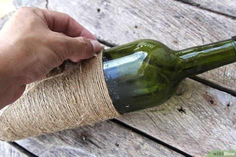 How to Make Twine Wrapped Vases from Wine Bottles: 10 Steps Twine Wine Bottles, Twine Wrapped Bottles, Wine Bottle Centerpieces, Wrapped Wine Bottles, Old Wine Bottles, Recycled Wine Bottles, Wine Craft, Wine Cork Crafts, Wine Bottle Art