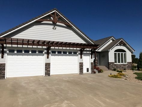 Pergola over Garage Door with Wooden Bracket 10T11 - TimberBuild.com Pergola Over Garage Door, Pergola Over Garage, Over Garage Door, Window Pergolas, White Garage Doors, Door Pergola, Driveway Entrance Landscaping, Garage Windows, Garage Pergola