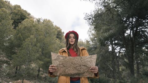 Portrait of a female hiker standing in the forest reading the map | Premium Photo #Freepik #photo #tree #people #travel #education Map Portrait, Female Hiker, Banksy Mural, Picnic Photo Shoot, Tree People, Adventure Map, Photo Tree, Travel Maps, Outdoor Brands