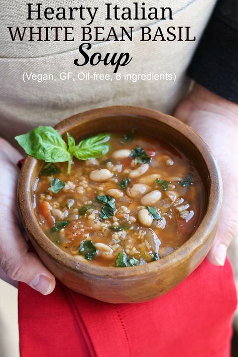 Vegan Oil-free Hearty Italian White Bean Basil Soup is full of Italian herbs and fresh basil and is super hearty thanks to protein-rich white beans and hearty rice. This will have your house smelling absolutely amazing too! Basil Soup, Oil Free Vegan, Bowl Of Soup, White Bean, Vegan Soup, Bean Soup, Delicious Soup, White Beans, Vegan Eating