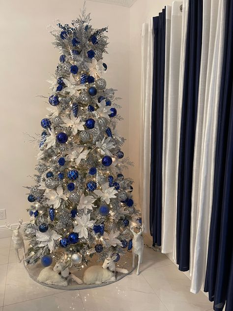 White And Blue Christmas Tree, White And Blue Christmas, Grey Christmas Tree, Poinsettia Leaves, Blue Christmas Tree Decorations, Christmas Tree Decorations Ribbon, Woodland Christmas Tree, Christmas Tree Inspo, White Poinsettia