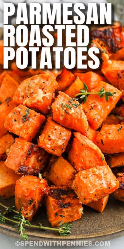 Serve these parmesan roasted sweet potatoes as an easy side dish with chicken, pork chops, or ham. We love the taste of sweet potatoes with parmesan & garlic, roasted until crispy! #spendwithpennies #parmesansweetpotatoes #recipe #sidedish #parmesanroastedpotatoes #sweetpotatoes #roastedpotatoes #roastedsweetpotatoes #crispy #easy #oven Parmesan Roasted Sweet Potatoes, Side Dish With Chicken, Crispy Sweet Potatoes, Sweet Potatoes In The Oven, Roasted Sweet Potato Cubes, Lemon Roasted Potatoes, Sweet Potato Oven, Sweet Potato Side Dish, Sweet Potato Recipes Roasted