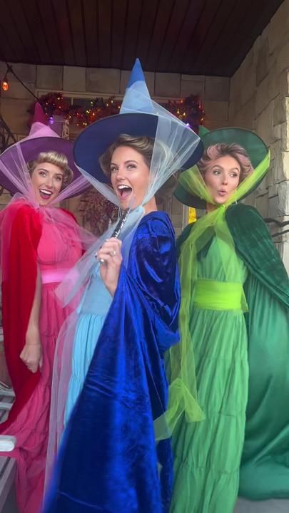 merryweather flora fauna costume｜Pesquisa do TikTok Three Fairy Godmother Costume, Flora Fauna And Merryweather Costume, Veggietales Costumes, Halloween Costumes Of 4, Disney Character Costume Ideas, Family Shrek Halloween Costumes, Fern Gully Costume, Magical Halloween Costumes, Disney Trio Halloween Costumes