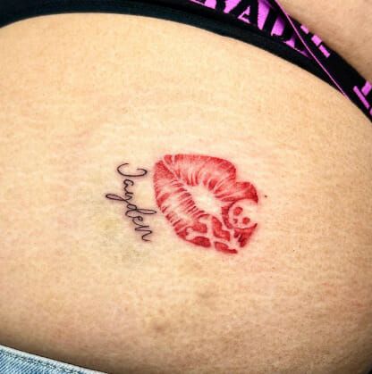 Small Tattoos On Buttocks For Women, Kiss Tattoo On Buttocks, Kiss On Buttcheek Tattoo, But Cheek Tattoo, Lips Buttcheek Tattoo, Kiss Tattoo Women, Tattoos On Buttocks For Women, Bite Me Tattoo Buttcheek, Sensual Tattoo For Women