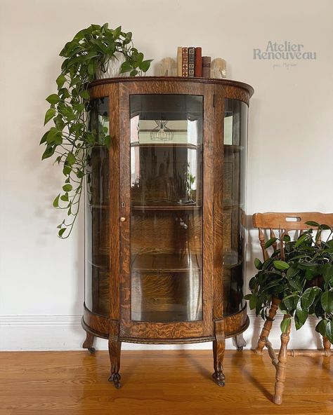 Restored antique curio cabinet made of quarter sawn oak #antique #antiquefurniturestyles #oak #oakfurniture #antiquehome Round China Cabinet, Curio Cabinet Aesthetic, Curved Curio Cabinet, Round Glass Hutch, Mid Century Curio Cabinet, Small Vintage Cabinet, Old Curio Cabinet Makeover, Plant Curio Cabinet, Kitchen With Antique Furniture