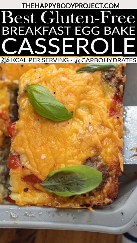 A slice of Gluten-Free Breakfast Egg Bake Casserole is being served from a ceramic dish. Topped with melted cheese, ground beef, and fresh basil leaves, it's a perfect breakfast treat. A silver spatula with a wooden handle peeks out alongside a striped kitchen towel, making this keto-friendly delight irresistible. Gluten Free Egg Bake Casserole, Keto Egg Casserole Recipes, Gluten Free Egg Bake, Gluten Free Egg Casserole, Egg Bake Recipes, Ham Egg Bake, Vegetarian Egg Casserole, Gluten Free Breakfast Casserole, Keto Breakfast Casserole