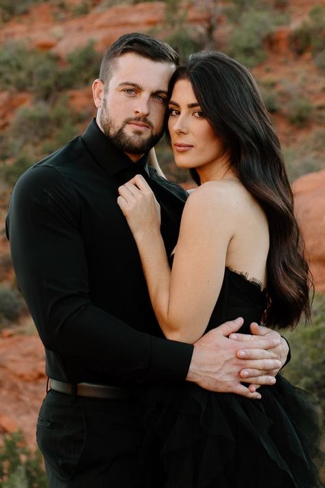 Formal-adventure-engagement-session-in-black-attire-in-Sedona,-Arizona.-Couples-photos-with-Wild-Love-&-Wanderlust.-Destination-elopement-in-black-wedding-dress.-Bell-Rock-hike.-Sultry,-moody,-goofy-couples-photography-against-the-red-rocks-in-Sedona.-Brunette-couple.-Black-on-black-formal-attire.-Adventure-wedding-photographer.