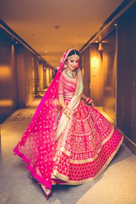 Lovely bride twirling on her wedding day in a pink bridal lehenga|WedMeGood| Gauri & Anshuman|#wedmegood #indianweddings #lehenga #bridallehenga #twirling #weddingday #pink #pinklehenga Wedding Lehngas, Wedding Lengha, Pink Bridal Lehenga, Orang India, Beautiful Lehenga, Indian Wedding Lehenga, Bridesmaid Photoshoot, Indian Wedding Gowns, Designer Bridal Lehenga Choli