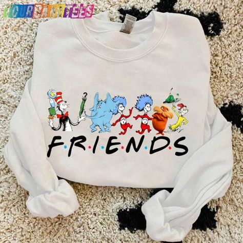 Cat In The Hat Friends Shirt Dr Seuss Horton Thing 1 2 Lorax Teacher Hoodie Sweatshirt Check more at https://tourbandtees.com/product/cat-in-the-hat-friends-shirt-dr-seuss-horton-thing-1-2-lorax-teacher-hoodie-sweatshirt/ Cat In The Hat Teacher Shirts, Dr Seuss Shirts For Teachers, Dr Seuss Teacher Shirts, Dr Seuss Shirt Ideas, Teacher Aide Outfits, Prek Shirts, Dr Suess Characters, Dr Seuss T Shirts, Dr Seuss Lorax