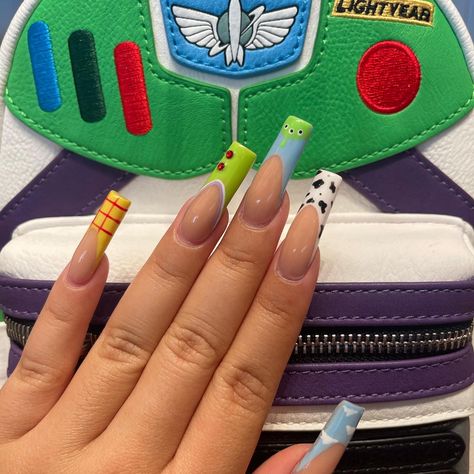 Disney Acrilyc Nails, Cartoon French Tip Nails, Long Disney Acrylic Nails, Disney Themed Nails Acrylic Long, Buzz Light Year Nails, Fall Theme Nails Acrylic, Nail Inspo Disney, Disney Nail Inspo Simple, Disney Nails Long