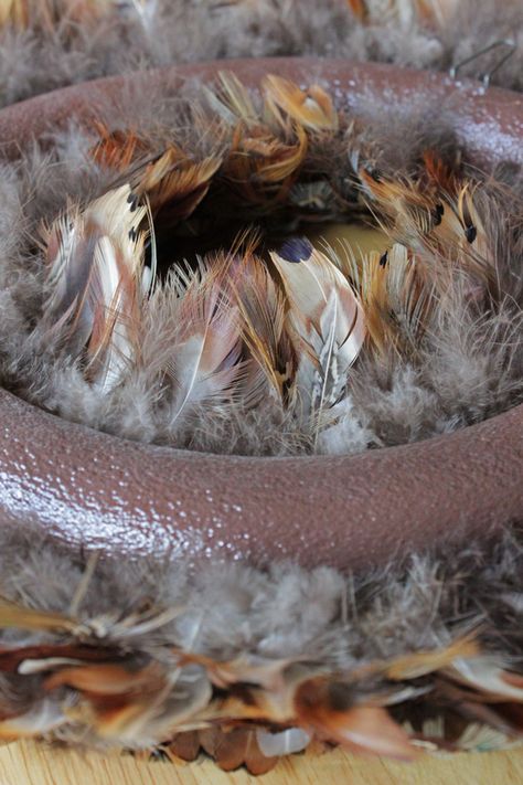 How-to: Pheasant Feather Wreath | HandsOccupied.com Feather Wreath Ideas, Pheasant Feather Decor, Waterfowl Taxidermy, Feather Arrangements, Hunting Diy, Porch Wreath, Feather Wreath, Pheasant Feather, Hunting Decor