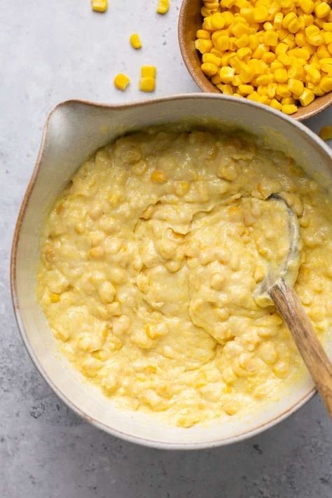 Nothing is cozier than this Corn Pudding Recipe! Made with multiple types of corn, delicious Jiffy muffin mix, and butter on butter, this cozy recipe hits the spot on any chilly fall evening! Pair it with your favorite main course for a complete meal, or enjoy a serving as a snack! Jiffy Corn Pudding Recipe, Easy Corn Pudding, Corn Pudding Recipe, Jiffy Corn Muffins, Spoon Bread, Jiffy Corn Muffin Mix, Cream Style Corn, Fall Evening, Corn Muffin Mix