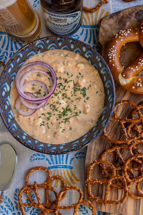 Obatzda is a craveable German cheese dip enhanced with beer, onion, and spices. Serve it with glorious warm, soft pretzels or rustic bread to dip or spread and enjoy. Whether you’re celebrating Oktoberfest, the big game, or simply your love of cheese, this easy recipe is sure to please. German Party Food, German Beer Cheese, German Beer Cheese Dip, German Cheese, German Pretzels, German Party, Octoberfest Food, Beer Cheese Dip, Rustic Bread