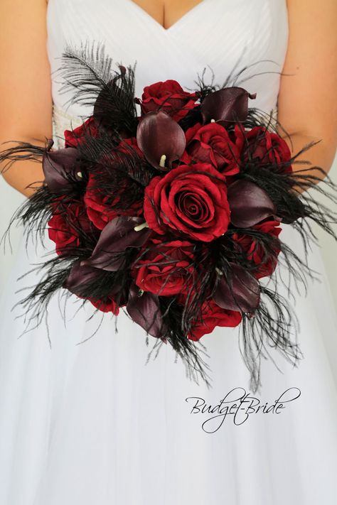 This stunning brides bouquet is hand held bouquet with a mixture of dark red roses and wine calla lilies accented with black feathers. This bouquet is approx 12 inches wide Wine Wedding Flowers, Black Wedding Flowers, Pretty Wedding Bouquet, Gothic Wedding Theme, Blush Bouquet Wedding, Rock Cake, Spring Wedding Bouquets, Red Wedding Theme, Dark Red Roses