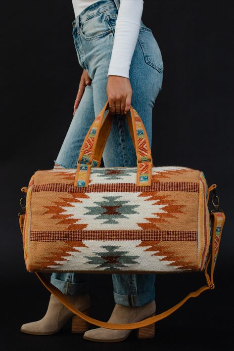 All our western lovers - this duffel is for you! Our restocked brown, rust, teal and cream Aztec inspired duffel bag is a must have for all of your travels - big & small - this year! Sac Week End, Graphic Tee Dress, Denim Sweater, Aztec Designs, Duffel Bags, Color Inspo, Pretty Patterns, Aztec Print, Tee Dress