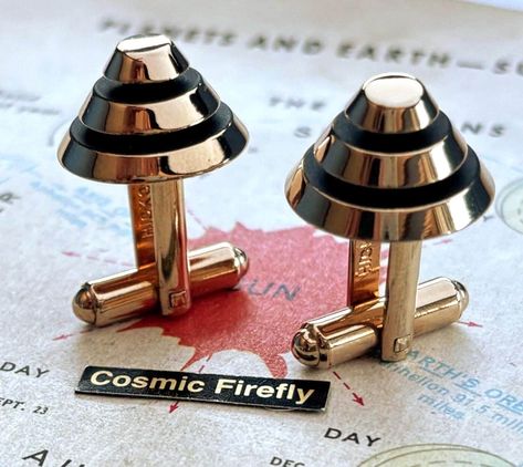 1950's Mid Century Vintage modernist atomic age cufflinks. Geometric art deco round cone brass plated metal with black grooves.  Made in USA by HICKOK Brand in the 1950's and sold in finer department stores and men's shops of the era. Preowned gently used vintage cufflinks have minor wear and tarnish from age these are over 75 years old! FREE GIFT BOX INCLUDED. Mid century modern atomic space age Hollywood elegance style. Description, & Photos Copyright © Cosmic Firefly * Vintage 1950's men's co