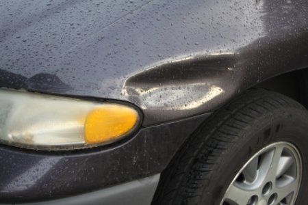 Repair a Dent in Your Car | DoItYourself.com Dangerous Driving, Battery Repair, Car Dent, Damaged Cars, Making Decisions, Dent Repair, Automotive Paint, Manual Car, Repair Shop