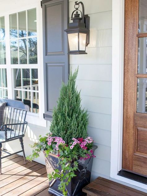 Topiary In Pots Front Doors, Fixer Upper Exterior Paint Colors, Fixer Upper Exterior, Door Planters, Oversized Planters, Carriage Lamps, Miracle Workers, Fall Landscaping, Magnolia House