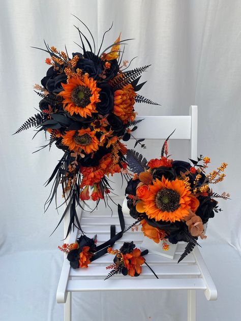 Custom Realistic Artificial Gothic Black Orange Cascading Wedding Bouquet This stunning bouquet has been custom made with quality silk & real touch flowers. The bouquet handle has been hand wrapped with black jute twine.  This bouquet is approximately 18 x 12 inches (45 x 30cm) The matching buttonhole has also been made with silk & real touch flowers & all buttonholes come with integral pin attached. These bouquets are also available in another listing in our shop Bridal bouquet - 10 inches diameter Corsages Black Red And Orange Wedding, Black And Orange Fall Wedding, Orange And Black Wedding Theme, Black And Orange Wedding Theme, Halloween Wedding Bouquet, Black And Rustic Orange Wedding, Orange And Black Flowers, Halloween Wedding Colors, Orange And Black Wedding