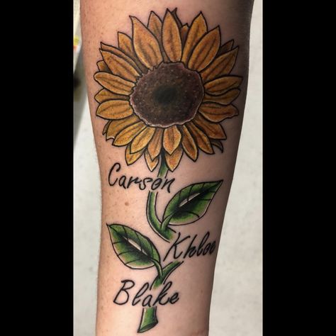 #mykids #sunflowertattoo Name And Sunflower Tattoo, Sunflower Name Tattoos For Women, Sunflower Tattoos With Names, Sunflower With Name Tattoo, Sunflower Tattoo With Kids Names, Sunflower Memorial Tattoo Mom, Sunflower Tattoo In Memory Of Mom, Kids Initial Tattoos, Name Tattoos On Wrist