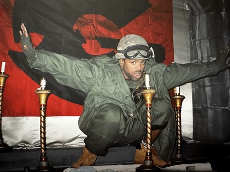 Method Man shooting the video for "Shadowboxin," a track in GZA's album Liquid Swords in a church in Washington Heights, NYC,1995. With lyrics like "I breaks it down to the bone gristle," Wu-Tang Clan shoots, either on a video set, on the streets, or in a studio, always provide startling images and this was no exception. Method's fangs and army gear added to one of my favourite and most iconic hip-hop images.

📸 by Ernie Paniccioli Wu Tang Fashion, Gza Wu Tang, Method Man 90s, Liquid Swords, Hip Hop Images, Video Set, Down To The Bone, Men 90s, Ghostface Killah