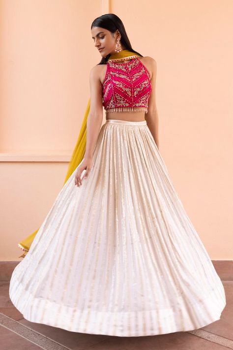 Buy #embellished #lehenga set by #BasantiKapdeAurKoffee at #Aza #Fashions Shop online now at #Azafashions.com Call +91 99870 70743 or email contactus@azafashions.com for enquiries. Lenga Choli Design Ideas Latest, Slim Lehenga, Sangeeth Dress Designs For Women, Halter Blouse Lehenga, White Crop Top For Lehenga, Lehenga Blouse Designs Halter Neck, Halter Neck Crop Top Lehenga, Modern Lehenga Designs Style, Halter Neck Blouses For Lehenga