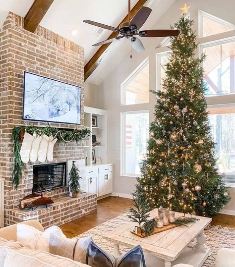 Tall Ceiling Living Room Christmas Tree, Vaulted Ceiling Living Room Christmas Tree, Vaulted Brick Fireplace, Vaulted Ceiling Christmas Tree, Brick Fireplace Tall Ceilings, Brick Fireplace Cathedral Ceiling, Vaulted Ceiling Christmas Decor, Christmas Tree In Front Of Window, Tall Brick Fireplace