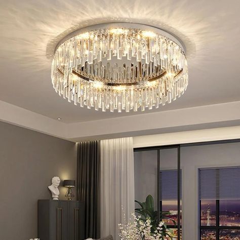 This modern ceiling lamp mainly uses stainless steel material, making it anti-rust, high-strength and durable. With beautiful crystals forming the lamp shade, it will cast a shimmering and beautiful reflection on the ceiling when on, adding elegance to your home. It is ideal for living rooms, bedrooms, dining rooms, etc. . . Find the lamp on the web: https://korewolamp.com/collections/ceiling-light/products/silver-round-crystal-ceiling-lamp . . Visit us for more： https://korewolamp.com/collec... Flush Mount Crystal Chandelier, Room Lamps Bedrooms, Stainless Steel Lamps, Classic Wall Lights, Modern Ceiling Lamps, Classic Chandeliers, Crystal Ceiling Light, Practical Lighting, Staircase Chandelier