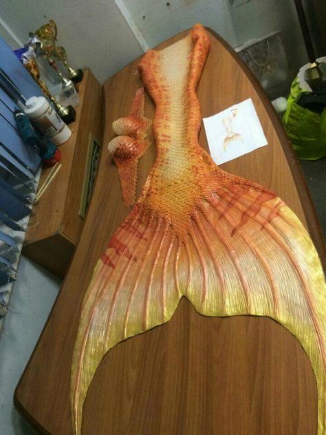 My silicone tail by evatails! Im finally a real mermaid! #evatails #Evartfx studio Yellow Mermaid Tail, Orange Mermaid Tail, Male Siren, Red Mermaid Tail, Realistic Mermaid Tails, Real Mermaid, Orange Mermaid, Mermaid Tail Costume, Swimmable Mermaid Tail