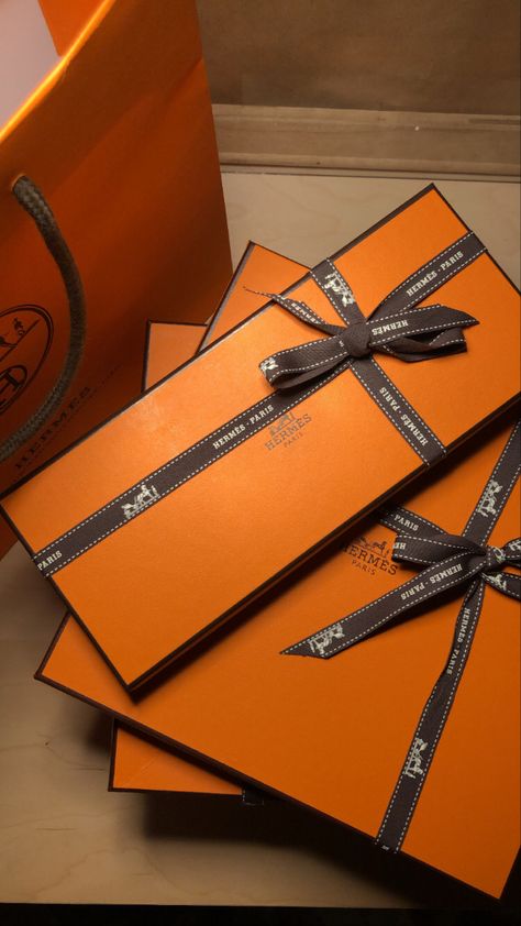 hermès orange boxes, hermes paris #hermes #hermesboxes #birkin #kelly #luxury #fashion Hermes Packaging, Hermes Gift, Hermes Boxes Decor, Hermes Box Packaging, Hermes Orange Aesthetic, Hermes Slides, Orange Box, Branded Shopping Bags, Hermes Orange