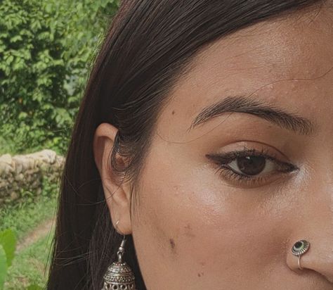 Desi aesthetic, black bindi, jhumka, oxidised jhumka, nosering, kajal, desi dark feminine, eye makeup Desi Dark Feminine Aesthetic, Kajal Eyes Aesthetic, Kajal Aesthetic, Dark Feminine Eye Makeup, Feminine Eye Makeup, Oxidised Jhumka, Beautiful Eyes Color, Eyes Color, Desi Aesthetic