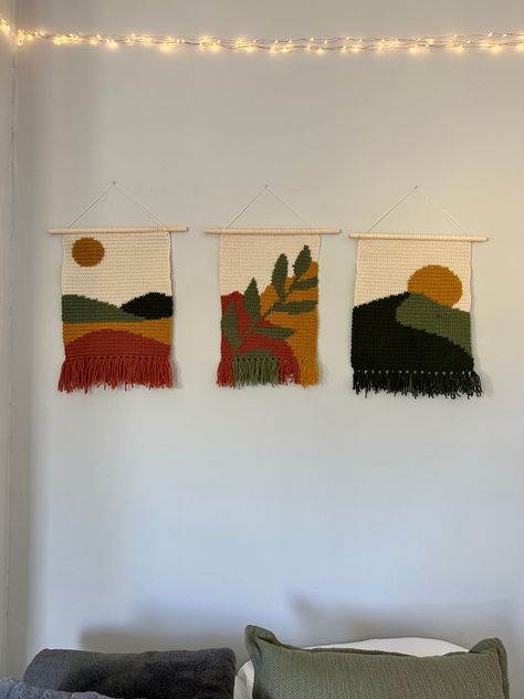 Three small crochet tapestries in a line, orange and green. Two mountain scenes and one leaf. Large Crochet Tapestry, Wall Crochet Decor, Crochet Tapestries, Crochet Critters, Tapestry Room, Crochet Wall Art, Macrame Dream Catcher, Easy Room Decor, Large Tapestries