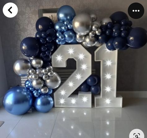 Blue Balloon Garlands, 21 Light Up Numbers With Balloons, 21 Balloon Garland, Blue And Silver Backdrop Ideas, Navy Blue And Silver Birthday Cake, 21st Birthday Backdrop Ideas For Guys, Blue 21st Birthday Decorations, Balloon Garland With Numbers, Light Up Numbers With Balloons